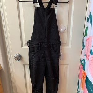 AE skinny black distressed overalls size 4 short